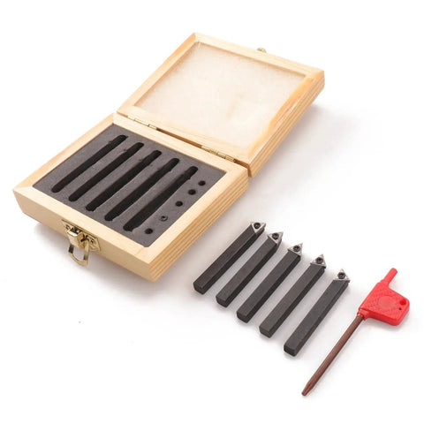 Five Piece Indexable Carbide Turning Tools Set With One Quarter Inch Shank For Turning Facing Boring And Chamfering Includes AL AR BL BR And E Style Holders And Rotatable Carbide Inserts Fits Most Mini Lathes And Bench Top Machines Oudtinx, displayed with a wooden storage box and hex key.