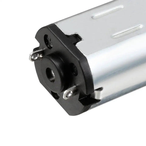 Close-up of Ultra Tiny DC Gear Motor 6V 10RPM Micro Speed Reducer Gearbox with metal box and D shape shaft.