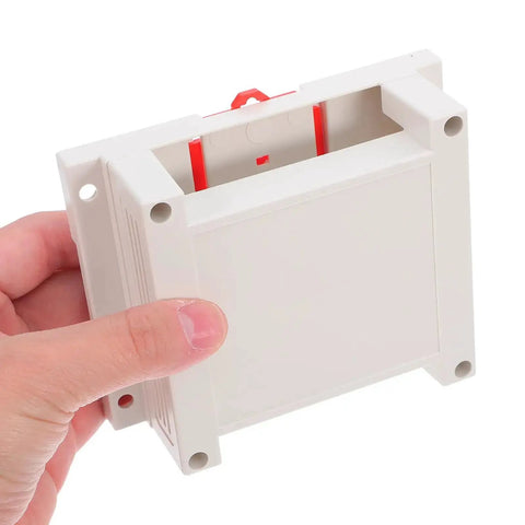 Hand holding Flame Retardant ABS Junction Box For Wall Mounted Outlets And DIY Control Panels, highlighting enclosure design