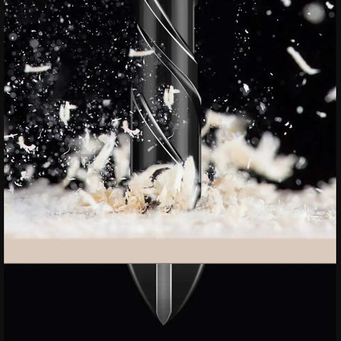 Close-up of Heavy Duty Masonry Drill Bit Set 10 Pc 5mm and 3 16th Inch Tungsten Carbide Tip drilling through wood