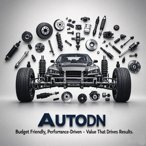 Car parts including suspension, shocks, and brake components on display behind a car frame with wheels, labeled AUTODN.