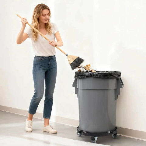 Person using broom next to trash can on adjustable 15-19 inch round drum dolly with locking wheels, heavy duty 440 lbs cart stand