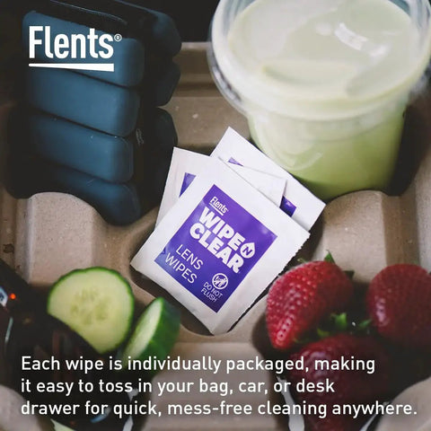 Pre Moistened Lens Wipes For Glasses And Sunglasses Streak Free And Travel Ready packets in a travel kit with snacks.