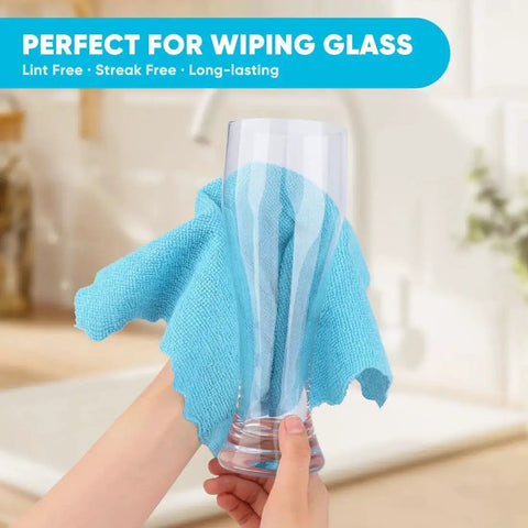 Person using Microfiber Cleaning Cloths 24 Pack Highly Absorbent Rags for Kitchen Car 12x11 to wipe a glass