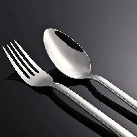 Close-up of fork and spoon from 20 Piece Flatware Set For 4 In 18/10 Stainless Steel, Mirror Polished Silverware, Dishwasher Safe.