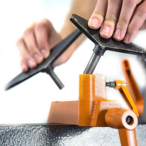 Hand adjusting tool rest on Mini Benchtop Wood Lathe With Variable Speed For Pens Bowls Cups Chess Pieces And More 8 Inch Swing 13 Inch Between Centers Soft Start Three Point Two Amp Motor By WEN Ideal For Small Projects And Fine Details.