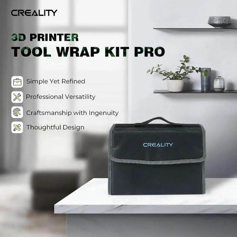Creality 3D Printer Tool Wrap Kit Pro in black on table next to plants and shelves in modern room setting