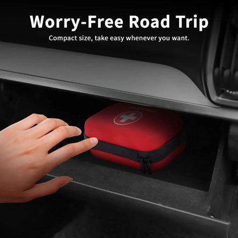 All In One First Aid Kit For Car Home Travel Camping And Office In Compact Waterproof Hard Case being stored in a car compartment.
