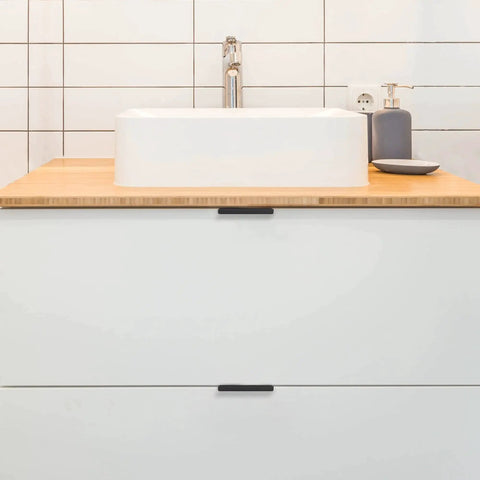 Bathroom cabinet with 6 Pack Finger Pulls For Cabinets With 76mm Hole Center And 102mm Overall Length Black Edge Pulls installed