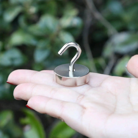 80lb Heavy Duty Magnetic Hooks For Cruise Cabins Refrigerator Grill And Travel held in hand showing size and design