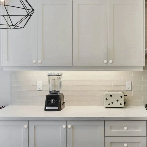 Modern kitchen with white cabinets featuring 10 Pack Brushed Satin Nickel Cabinet Knobs 1.2 Inch Round Drawer Knobs For Cabinets And Drawers.