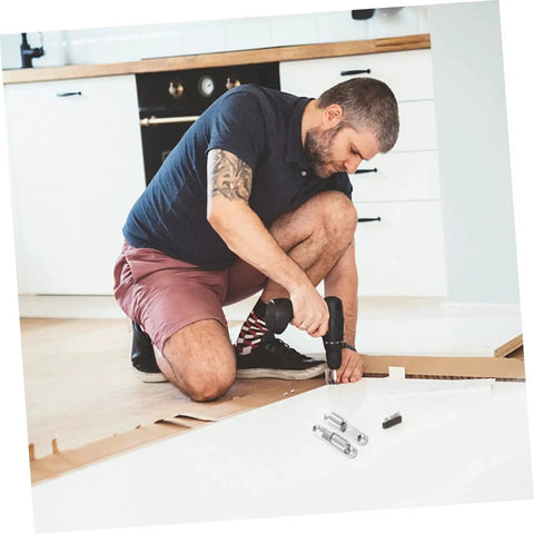 Man installing door using Sturdy Screw-On Metal Door Hinges 4 Pack For Internal Doors in kitchen renovation project.