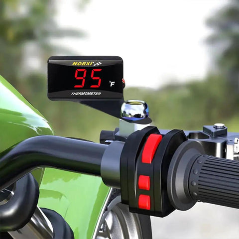 Universal Digital Engine Temperature Gauge With 10mm Or 14mm Probe Adapter installed on a motorcycle handlebar