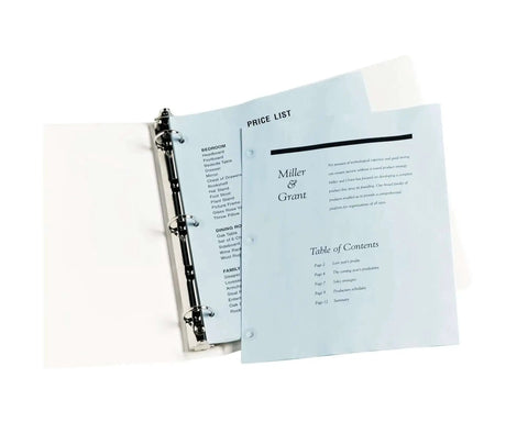 Clear Hole Reinforcement Labels For 3 Hole Punched Pages One Quarter Inch Diameter Non Printable Durable Polyvinyl Reinforcement Stickers Set Of 200 For Extending Page Life In Binders shown in binder with blue pages.