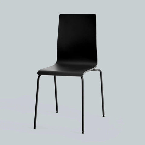 Black modern chair with sleek design and metal legs on a light gray background.