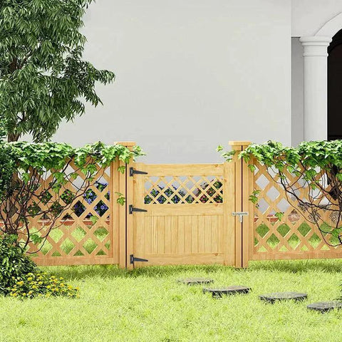 Wooden gate with 12 Pack 4 Inch T Strap Hinges Black for Shed Barn Gates and Fences, installed on a garden fence with greenery.