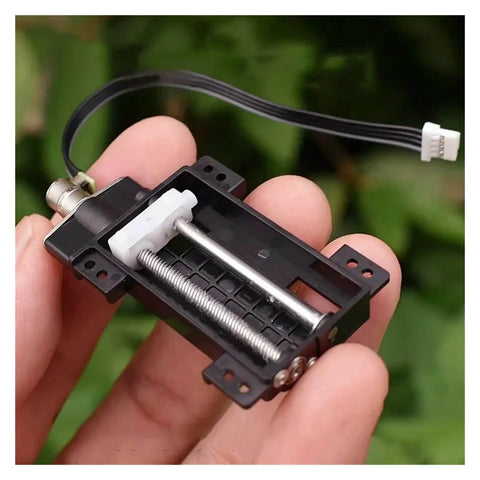 Tiny 6mm Precision Planetary Stepper Motor With Micro 2 Phase 4 Wire Stepping in hand, showing 30mm stroke linear lead screw