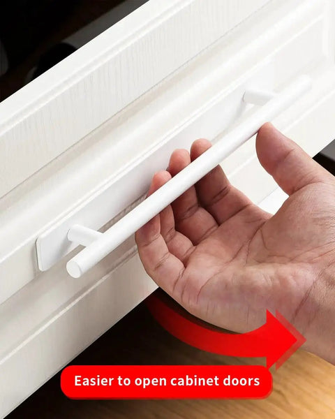 Hand demonstrating use of Two Pack Stick On Cabinet Handles White Self Adhesive Drawer Pulls Closet Doors For Kitchen Sliding Glass And Shower Doors