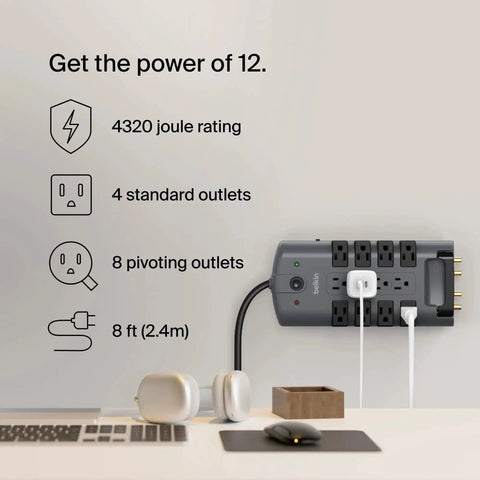 Surge Protector Power Strip With Eight Rotating Outlets And Four Standard Sockets, Eight-Foot Extension Cord, Flat Pivot Plug, 4320 Joules Of Protection For Home Office Travel Desktop And Charging Gear on a desk setup.