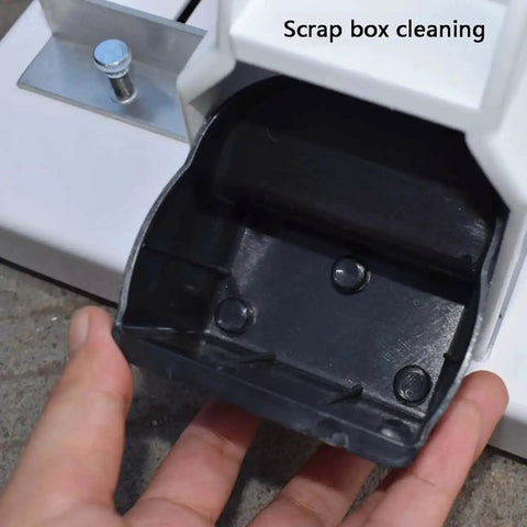 Close-up of scrap box cleaning on Heavy Duty Portable Handheld Paper Hole Punch With 4mm 5mm 6mm 7mm 8mm Holes.