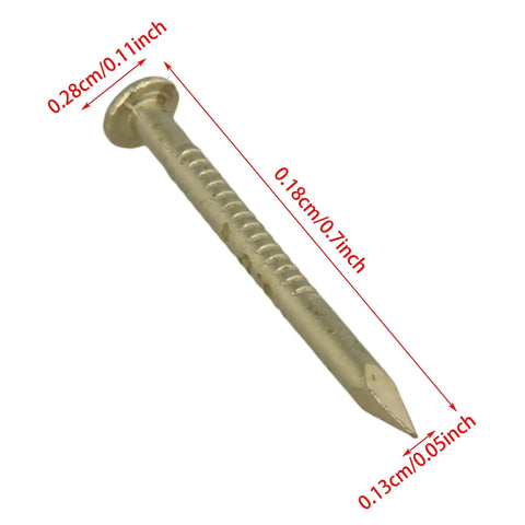 Close-up of a single antique round head brass copper mini nail, 2.8x18mm, highlighting 200 Pcs Antique Round Head Brass Copper Mini Nails For Furniture Hinges Boxes And Craft Projects 2.8x18mm Easy To Install Great For DIY Vintage Vibe And Timeless Finish.