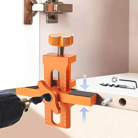 All Purpose Aluminum Cabinet Door Mounting Jig With Adjustable Positioner for Quick Frameless or Face Frame Cabinet Door Installations in Bright Orange Ideal For Diy Enthusiasts And Pros To Get Perfect Precise Results in use with drill.