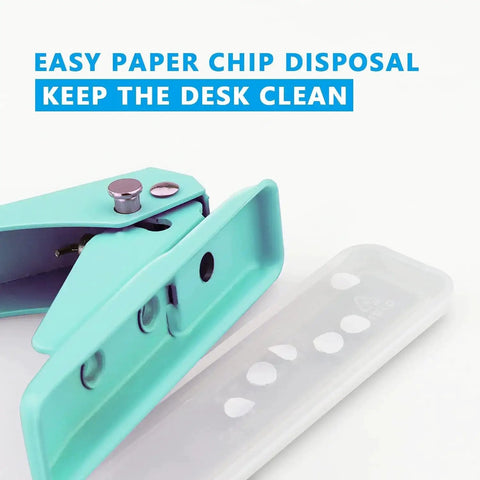 Close-up of green Grab And Go Handheld One Quarter Inch Hole Punch for up to twenty sheets with skid resistant base and paper chip disposal