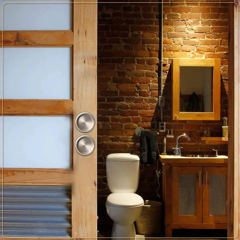 Satin Nickel Closet Door Finger Pull installed on sliding barn door in rustic bathroom