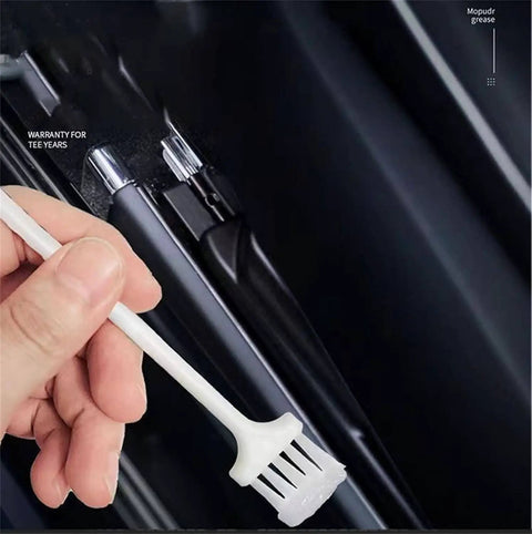 Applying High Temperature Multi Purpose Car Lubricant For Doors And Wheel Bearings with brush applicator