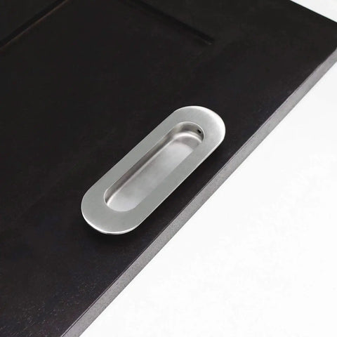 Stainless Steel Oval Recessed Sliding Door Flush Pull Handle 120mm By 40mm Brushed Satin Nickel Finish shown on dark door