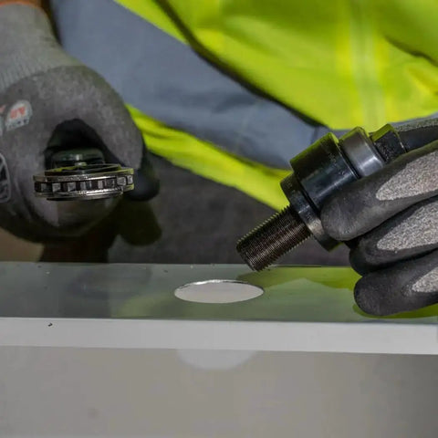 Using Knockout Punch Set With Wrench For Electrical Conduit One Half Inch To Two Inch Sizes Includes Punches Dies Draw Studs