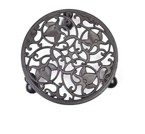 Top view of a Heavy Duty Cast Iron Plant Stand On Wheels For Indoor And Outdoor Use, 11 Inch Diameter and 3 Inch High Rolling Plant Caddy.