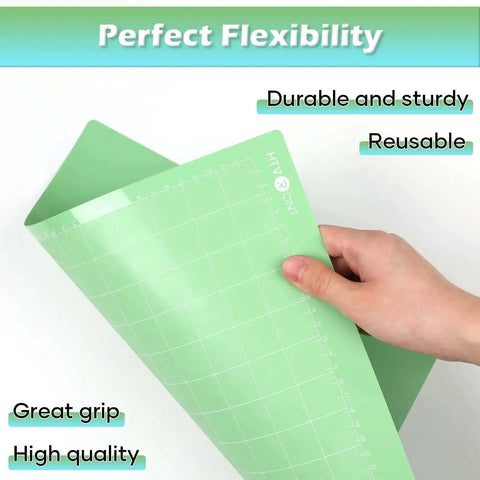 Hand holding green standard grip mat from Two Pack 12x12 Cutting Mats for Cricut Machines with Light Grip and Standard Grip Replacement Mats Set for Cricut Maker 3 Maker 4 Explore 3 4 Air 2 One Cutting Machine Compatible with Vinyl Paper Leather Craft Projects