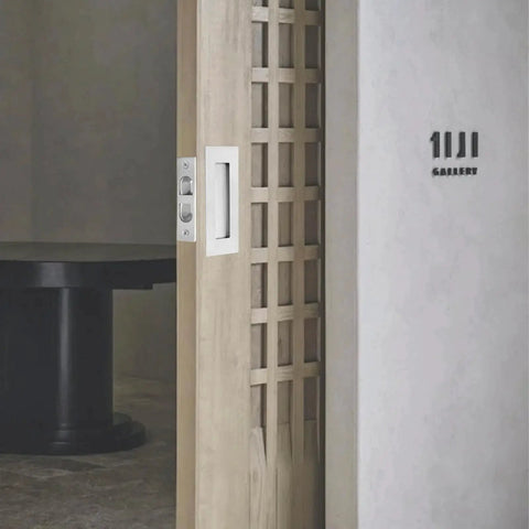 4 Inch Pocket Door Edge Pull Flush Mount Handle In 304 Stainless Steel for pocket door hardware, installed view on wooden door.