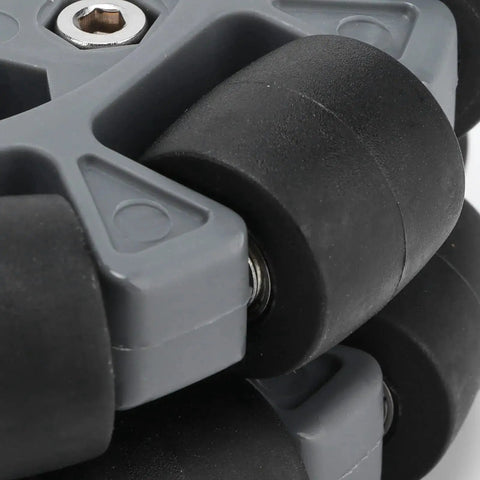Close-up of 100mm Nylon Rubber Omni Wheels built for robot race vehicles with durable double row design, highlighting rubber material.