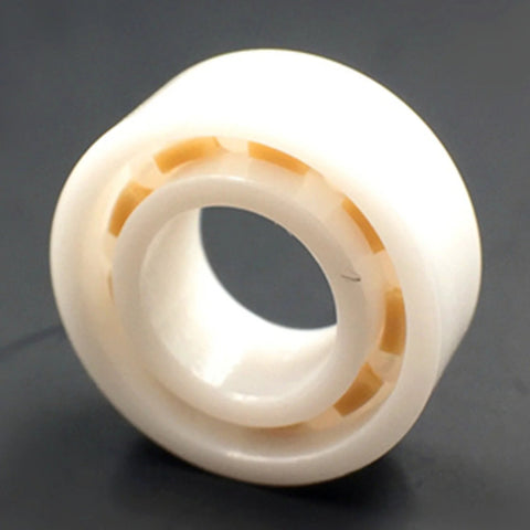R188 full ceramic ball bearing, 1/4 in ID x 1/2 in OD x 3/16 in wide, white ceramic with orange segments
