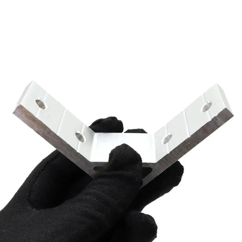 Gloved hand holding an L-shaped 10 Pack 1 Inch Slot Aluminum Corner Bracket For 1010 And 2525 Extrusions, showing 4 bolt holes for DIY frames.