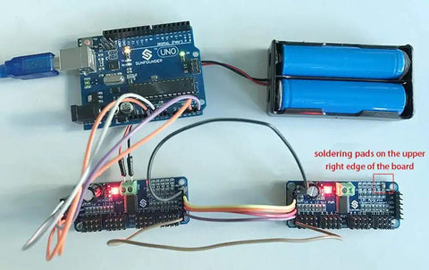 16 Channel 12 Bit PWM Servo Motor Driver Board With I2C Interface connected to Arduino and battery pack