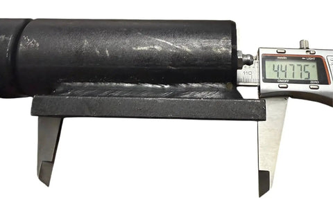 Close-up of a Beefy 9 Inch Barrel Hinge With Plate Weld-On For Heavy Duty Gates, measuring 1.75 inches wide with caliper.