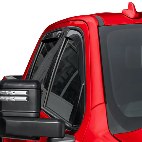 Close-up view of In Channel Rain Guards For Silverado 2500HD 3500HD Crew Cab 2020 Through 2026 on red truck window.