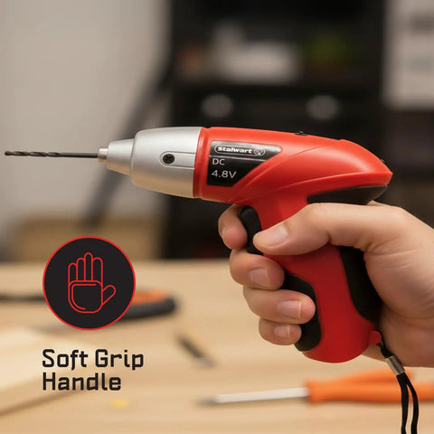 Hand holding red 25-Piece Cordless Screwdriver Set With LED Work Light, soft grip handle, ideal for DIY projects.