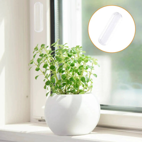 Clear PU self adhesive recessed finger pulls on window frame, shown with plant in white pot for sliding glass doors, cabinets, drawers