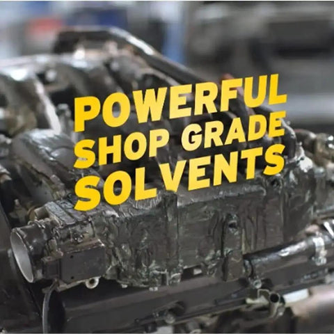 Engine block covered in heavy grease with text 'Powerful Shop Grade Solvents' demonstrating solvent strength.