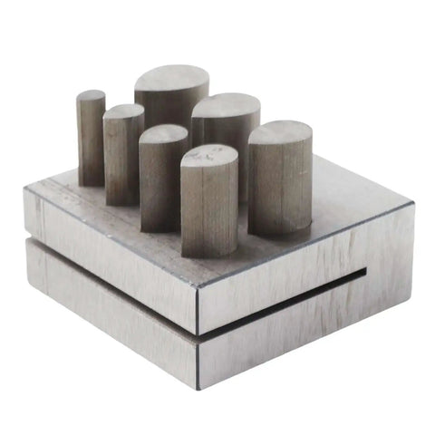 Punch Die Disc Cutter Set For DIY Jewelry Making, showing drop shaped dies in seven sizes on a 45 steel base.