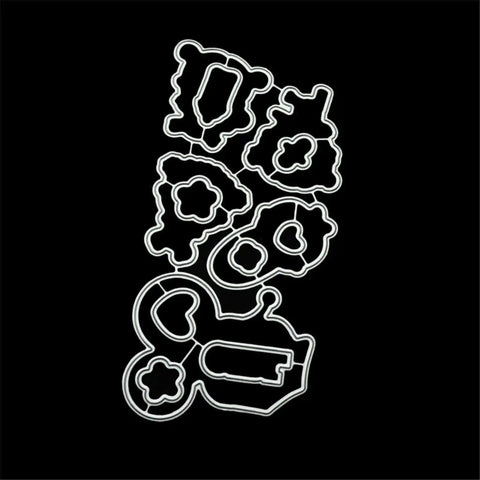 Carbon steel dies layout from Silicone Stamp And Die Set For Card Making And Scrapbooking, includes precise cut shapes for crafts.