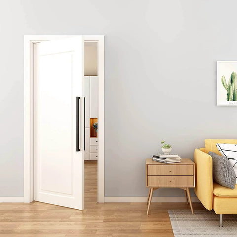 24 Inch Barn Door Push Pull Pro Grade Handle Set in Matte Black Stainless Steel on white door in modern living room