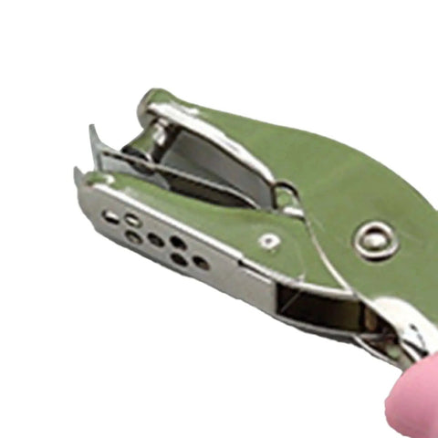 Close-up of 6mm Handheld Single Hole Punch For Paper With Durable Metal Body And Rubber Grip Handle The Go To Tool For School Home Office Campus.
