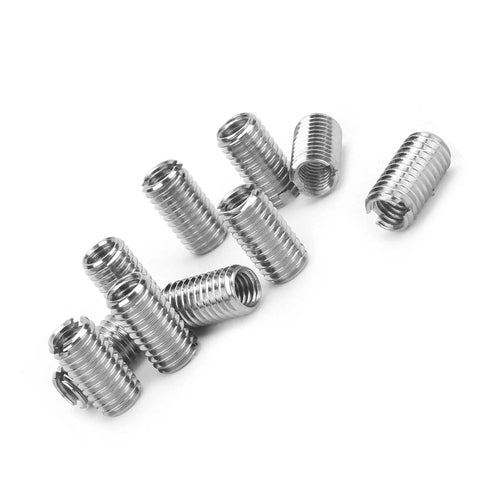 Front view of stainless steel threaded inserts for machinery repair; cylindrical, threaded sleeves.