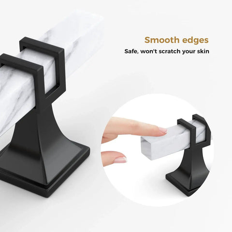 Close-up of Ten Pack White Marble Grain Kitchen Cabinet Knobs With Black T Bar Hardware showing smooth edges, zinc base, and aluminum handle.