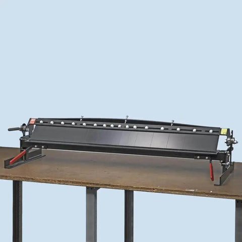 MB48B 48 Inch Pan Style Mini Brake on workbench for 135-degree bends in 22GA galvanized steel, single-person setup.
